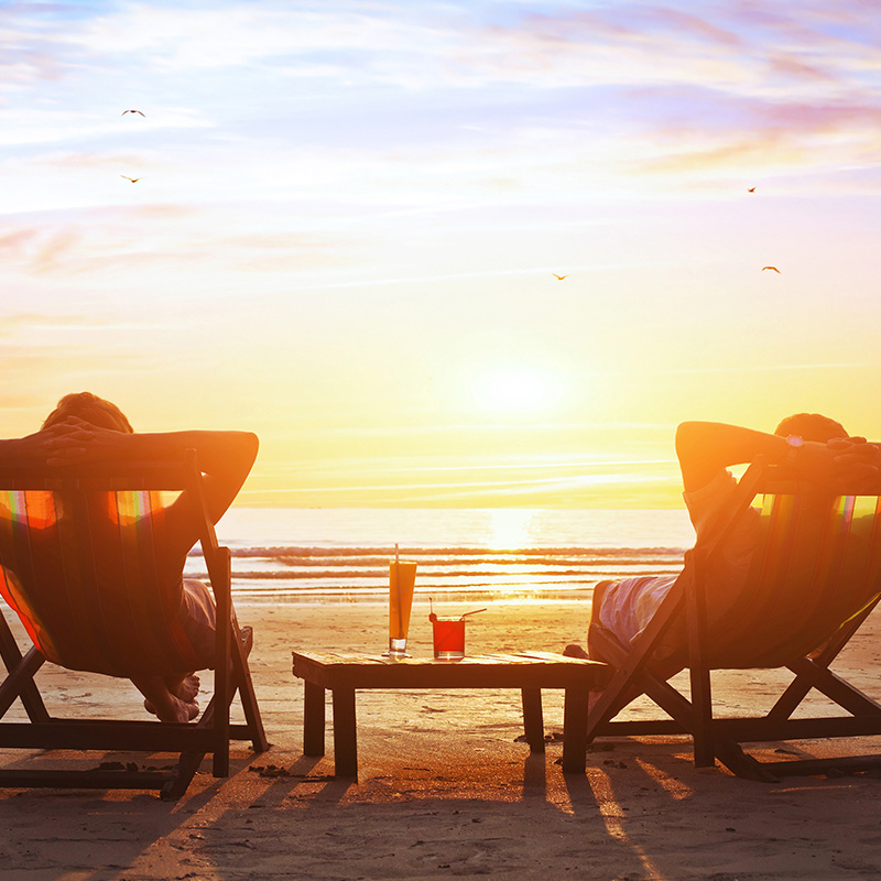 retired couple on the beach retired couple on the beach